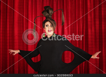 To use this stock image in your creative project, please select the size you need over to the right and click the "Add to Cart" button.
Your downloaded image will come with the Cutcaster watermark removed so don’t worry about the watermark you see on this page. Drag Queen in Weird Dress stock photo, Smiling man in drag wearing unique dress and hairdo by Scott Griessel