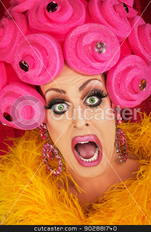 To use this stock image in your creative project, please select the size you need over to the right and click the "Add to Cart" button.
Your downloaded image will come with the Cutcaster watermark removed so don’t worry about the watermark you see on this page. Screaming Drag Queen Close up stock photo, Screaming drag queen with pink foam wig in theater by Scott Griessel