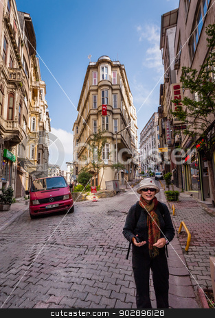 To use this stock image in your creative project, please select the size you need over to the right and click the "Add to Cart" button.
Your downloaded image will come with the Cutcaster watermark removed so don’t worry about the watermark you see on this page. Tourist in Istanbul stock photo, ISTANBUL, TURKEY – APRIL 27: Building with flag and tourist on April 27, 2012 in Istanbul, Turkey. Each year patriotic Turks honor those fallen at the battle of Galipoli during World War I. by Scott Griessel