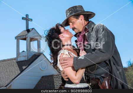 To use this stock image in your creative project, please select the size you need over to the right and click the "Add to Cart" button.
Your downloaded image will come with the Cutcaster watermark removed so don’t worry about the watermark you see on this page. Romantic Old West Man and Woman stock photo, Romantic Old West Man and Woman Embrace by Scott Griessel