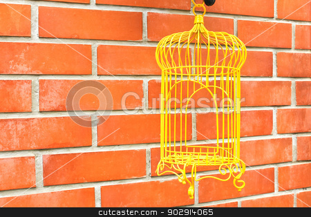 To use this stock image in your creative project, please select the size you need over to the right and click the "Add to Cart" button.
Your downloaded image will come with the Cutcaster watermark removed so don’t worry about the watermark you see on this page. Yellow Birdcage on brick wall background. stock photo, Yellow Birdcage on brick wall background. by doraclub