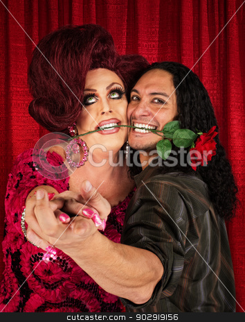 To use this stock image in your creative project, please select the size you need over to the right and click the "Add to Cart" button.
Your downloaded image will come with the Cutcaster watermark removed so don’t worry about the watermark you see on this page. Happy Dancers with Rose in Mouth stock photo, Happy eccentric dancing couple with rose in mouth by Scott Griessel