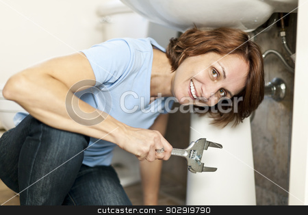 To use this stock image in your creative project, please select the size you need over to the right and click the "Add to Cart" button.
Your downloaded image will come with the Cutcaster watermark removed so don’t worry about the watermark you see on this page. Woman fixing plumbing stock photo, Confident woman repairing sink in bathroom at home by Elena Elisseeva