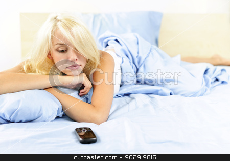 To use this stock image in your creative project, please select the size you need over to the right and click the "Add to Cart" button.
Your downloaded image will come with the Cutcaster watermark removed so don’t worry about the watermark you see on this page. Woman waiting by phone in bed stock photo, Sad blonde woman waiting for phone call in bed at home by Elena Elisseeva