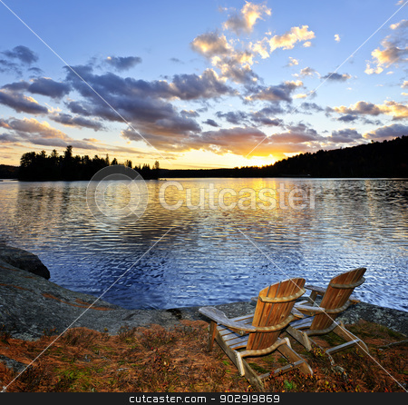 To use this stock image in your creative project, please select the size you need over to the right and click the "Add to Cart" button.
Your downloaded image will come with the Cutcaster watermark removed so don’t worry about the watermark you see on this page. Wooden chairs at sunset on beach stock photo, Wooden chair on beach of relaxing lake at sunset in Algonquin Park, Canada by Elena Elisseeva