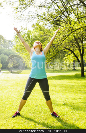 To use this stock image in your creative project, please select the size you need over to the right and click the "Add to Cart" button.
Your downloaded image will come with the Cutcaster watermark removed so don’t worry about the watermark you see on this page. Woman exercising in park stock photo, Female fitness instructor stretching at green park in the morning by Elena Elisseeva