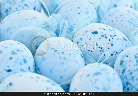 To use this stock image in your creative project, please select the size you need over to the right and click the "Add to Cart" button.
Your downloaded image will come with the Cutcaster watermark removed so don’t worry about the watermark you see on this page. Blue Easter eggs stock photo, Pale blue speckled painted Easter eggs with ribbons by Elena Elisseeva