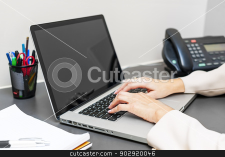 To use this stock image in your creative project, please select the size you need over to the right and click the "Add to Cart" button.
Your downloaded image will come with the Cutcaster watermark removed so don’t worry about the watermark you see on this page. Hands typing on laptop keyboard stock photo, Female hands typing on laptop keyboard at office desk by Elena Elisseeva