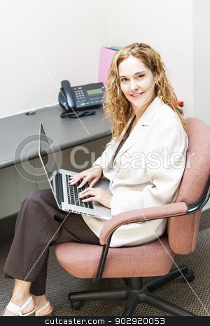 To use this stock image in your creative project, please select the size you need over to the right and click the "Add to Cart" button.
Your downloaded image will come with the Cutcaster watermark removed so don’t worry about the watermark you see on this page. Woman typing on laptop computer at work stock photo, Confident businesswoman sitting at workstation in office with computer by Elena Elisseeva