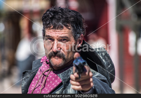 To use this stock image in your creative project, please select the size you need over to the right and click the "Add to Cart" button.
Your downloaded image will come with the Cutcaster watermark removed so don’t worry about the watermark you see on this page. Angry Cowboy With Gun stock photo, a cowboy pointing gun at camera by Scott Griessel