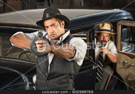 To use this stock image in your creative project, please select the size you need over to the right and click the "Add to Cart" button.
Your downloaded image will come with the Cutcaster watermark removed so don’t worry about the watermark you see on this page. 1920s Era Gangsters with Guns and Car stock photo, 1920s vintage gangsters outside of antique automobile by Scott Griessel