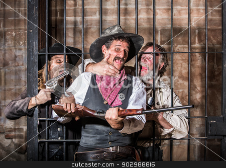 To use this stock image in your creative project, please select the size you need over to the right and click the "Add to Cart" button.
Your downloaded image will come with the Cutcaster watermark removed so don’t worry about the watermark you see on this page. Prison Riot stock photo, Prisoners Revolt in an Old West Jail by Scott Griessel