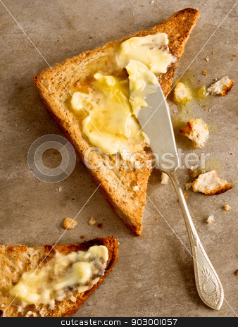 To use this stock image in your creative project, please select the size you need over to the right and click the "Add to Cart" button.
Your downloaded image will come with the Cutcaster watermark removed so don’t worry about the watermark you see on this page. toasted butter stock photo, close up of toast bread with melted butter by zkruger