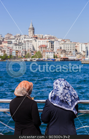 To use this stock image in your creative project, please select the size you need over to the right and click the "Add to Cart" button.
Your downloaded image will come with the Cutcaster watermark removed so don’t worry about the watermark you see on this page. Muslim women on the Bosphorus stock photo, Muslim women with scarves on the Bosphorus by Scott Griessel