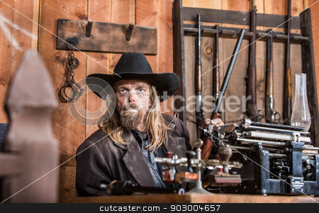 To use this stock image in your creative project, please select the size you need over to the right and click the "Add to Cart" button.
Your downloaded image will come with the Cutcaster watermark removed so don’t worry about the watermark you see on this page. Portrait of a Cowboy stock photo, Portrait of a Stern Cowboy in Office by Scott Griessel