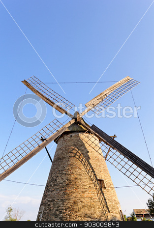 To use this stock image in your creative project, please select the size you need over to the right and click the "Add to Cart" button.
Your downloaded image will come with the Cutcaster watermark removed so don’t worry about the watermark you see on this page. Old wooden mill against the blue sky stock photo, Old wooden windmill against the blue sky by Jozsef Demeter