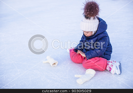 To use this stock image in your creative project, please select the size you need over to the right and click the "Add to Cart" button.
Your downloaded image will come with the Cutcaster watermark removed so don’t worry about the watermark you see on this page. Little adorable girl sitting on ice with skates after the fall stock photo, Little adorable girl sitting on the ice with skates after the fall by Dmitry Travnikov