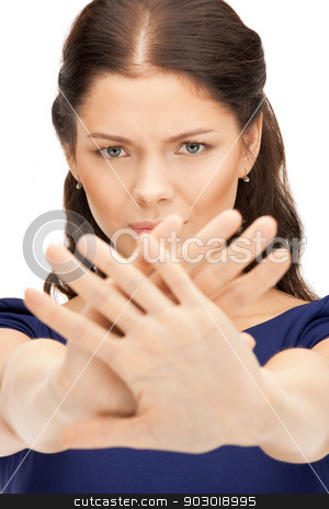 To use this stock image in your creative project, please select the size you need over to the right and click the "Add to Cart" button.
Your downloaded image will come with the Cutcaster watermark removed so don’t worry about the watermark you see on this page. woman making stop gesture stock photo, bright picture of young woman making stop gesture by Syda Productions