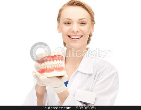 To use this stock image in your creative project, please select the size you need over to the right and click the "Add to Cart" button.
Your downloaded image will come with the Cutcaster watermark removed so don’t worry about the watermark you see on this page. doctor with jaws stock photo, picture of attractive female doctor with jaws by Syda Productions