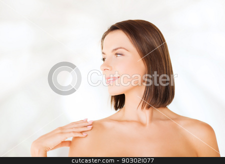 To use this stock image in your creative project, please select the size you need over to the right and click the "Add to Cart" button.
Your downloaded image will come with the Cutcaster watermark removed so don’t worry about the watermark you see on this page. beautiful woman touching her shoulders stock photo, beauty, spa, health and people concept - beautiful woman touching her shoulders by Syda Productions