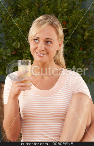 To use this stock image in your creative project, please select the size you need over to the right and click the "Add to Cart" button.
Your downloaded image will come with the Cutcaster watermark removed so don’t worry about the watermark you see on this page. vitamins collect stock photo, Young woman drinking a glass of healthy juice by Roland Stollner