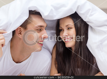 To use this stock image in your creative project, please select the size you need over to the right and click the "Add to Cart" button.
Your downloaded image will come with the Cutcaster watermark removed so don’t worry about the watermark you see on this page. happy couple sleeping in bed stock photo, hotel, travel, relationships, and happiness concept - happy couple in bed by Syda Productions