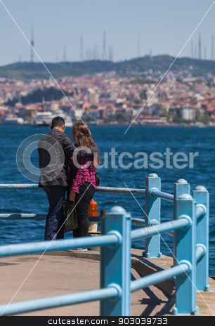To use this stock image in your creative project, please select the size you need over to the right and click the "Add to Cart" button.
Your downloaded image will come with the Cutcaster watermark removed so don’t worry about the watermark you see on this page. Turkish Couple Along the Bosphorus stock photo, Young Turkish Couple Along the Bosphorus by Scott Griessel