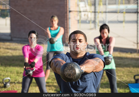 To use this stock image in your creative project, please select the size you need over to the right and click the "Add to Cart" button.
Your downloaded image will come with the Cutcaster watermark removed so don’t worry about the watermark you see on this page. Four People Using Weights stock photo, Four people exercising in outdoor boot camp with kettle bells by Scott Griessel