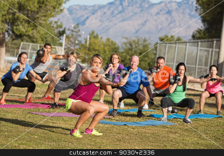 To use this stock image in your creative project, please select the size you need over to the right and click the "Add to Cart" button.
Your downloaded image will come with the Cutcaster watermark removed so don’t worry about the watermark you see on this page. Diverse Group Adults Exercising stock photo, Serious boot camp exercise class squatting with weights by Scott Griessel