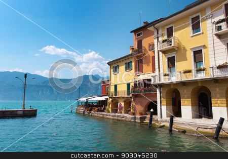 To use this stock image in your creative project, please select the size you need over to the right and click the "Add to Cart" button.
Your downloaded image will come with the Cutcaster watermark removed so don’t worry about the watermark you see on this page. Malcesine coast stock photo, Malcesine, coast of lake Garda, focus on house facades by Natalia Macheda