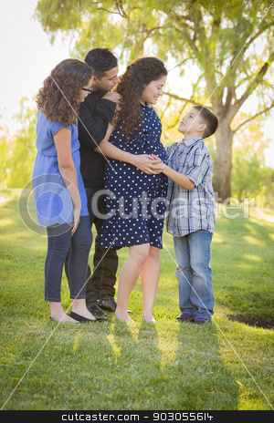 To use this stock image in your creative project, please select the size you need over to the right and click the "Add to Cart" button.
Your downloaded image will come with the Cutcaster watermark removed so don’t worry about the watermark you see on this page. Happy Attractive Hispanic Family With Their Pregnant Mother Outd stock photo, Happy Attractive Hispanic Family With Their Pregnant Mother Outdoors At the Park. by Andy Dean
