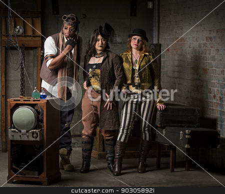 To use this stock image in your creative project, please select the size you need over to the right and click the "Add to Cart" button.
Your downloaded image will come with the Cutcaster watermark removed so don’t worry about the watermark you see on this page. Steampunk Trio stock photo, Three Young Diverse Steampunks in Retro Lair by Scott Griessel