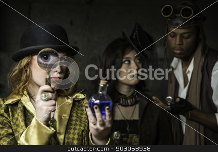 To use this stock image in your creative project, please select the size you need over to the right and click the "Add to Cart" button.
Your downloaded image will come with the Cutcaster watermark removed so don’t worry about the watermark you see on this page. Steampunk with Magnifying Glass stock photo, Steam Punks in Underground Lair with Potion and Magnifying Glass by Scott Griessel