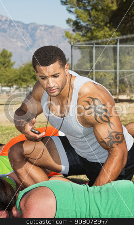 To use this stock image in your creative project, please select the size you need over to the right and click the "Add to Cart" button.
Your downloaded image will come with the Cutcaster watermark removed so don’t worry about the watermark you see on this page. Trainer With Outdoor Fitness Class stock photo, Athletic trainer with tattoo and outdoor fitness class by Scott Griessel