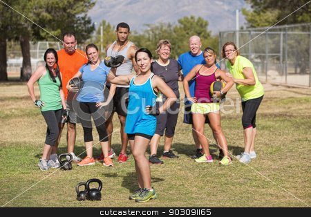 To use this stock image in your creative project, please select the size you need over to the right and click the "Add to Cart" button.
Your downloaded image will come with the Cutcaster watermark removed so don’t worry about the watermark you see on this page. Cute Woman Posing with Fitness Group stock photo, Cute Latino female lifting weights with fitness group by Scott Griessel
