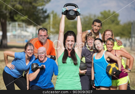 To use this stock image in your creative project, please select the size you need over to the right and click the "Add to Cart" button.
Your downloaded image will come with the Cutcaster watermark removed so don’t worry about the watermark you see on this page. Smilng Lady Lifting Kettle Bell stock photo, Group of people watching woman lifting kettle bell weights by Scott Griessel