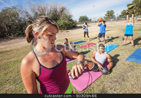 To use this stock image in your creative project, please select the size you need over to the right and click the "Add to Cart" button.
Your downloaded image will come with the Cutcaster watermark removed so don’t worry about the watermark you see on this page. Fitness Trainer Checking Time stock photo, Boot camp fitness trainer checking group with stopwatch by Scott Griessel