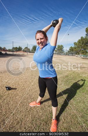 To use this stock image in your creative project, please select the size you need over to the right and click the "Add to Cart" button.
Your downloaded image will come with the Cutcaster watermark removed so don’t worry about the watermark you see on this page. Enthusiastic Woman Exercising Outdoors stock photo, Enthusiastic Caucasian woman exercising with kettle bell weight outdoors by Scott Griessel