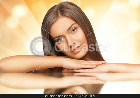 To use this stock image in your creative project, please select the size you need over to the right and click the "Add to Cart" button.
Your downloaded image will come with the Cutcaster watermark removed so don’t worry about the watermark you see on this page. beautiful woman with long hair stock photo, face and hands of beautiful woman with long hair by Syda Productions