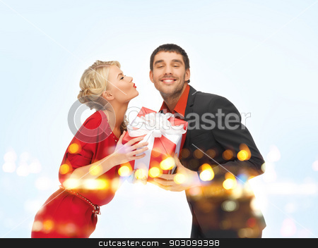 To use this stock image in your creative project, please select the size you need over to the right and click the "Add to Cart" button.
Your downloaded image will come with the Cutcaster watermark removed so don’t worry about the watermark you see on this page. man and woman with present stock photo, picture of man and woman with present by Syda Productions