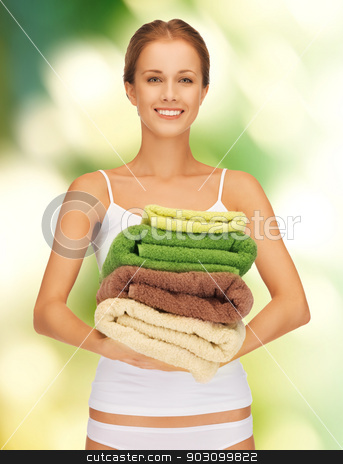 To use this stock image in your creative project, please select the size you need over to the right and click the "Add to Cart" button.
Your downloaded image will come with the Cutcaster watermark removed so don’t worry about the watermark you see on this page. lovely woman with towels stock photo, bright picture of lovely woman with towels. by Syda Productions