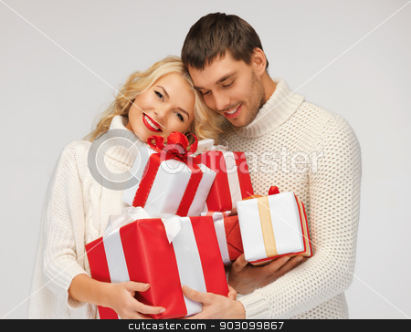 To use this stock image in your creative project, please select the size you need over to the right and click the "Add to Cart" button.
Your downloaded image will come with the Cutcaster watermark removed so don’t worry about the watermark you see on this page. romantic couple in a sweaters with gift boxes stock photo, picture of romantic couple in a sweaters with gift boxes by Syda Productions