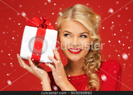 To use this stock image in your creative project, please select the size you need over to the right and click the "Add to Cart" button.
Your downloaded image will come with the Cutcaster watermark removed so don’t worry about the watermark you see on this page. lovely woman in red dress with present stock photo, picture of lovely woman in red dress with present by Syda Productions