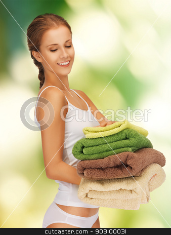 To use this stock image in your creative project, please select the size you need over to the right and click the "Add to Cart" button.
Your downloaded image will come with the Cutcaster watermark removed so don’t worry about the watermark you see on this page. lovely woman with towels stock photo, bright picture of lovely woman with towels. by Syda Productions