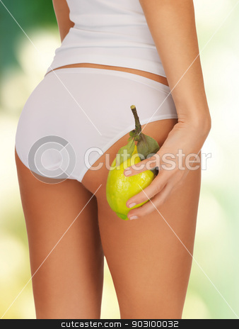 To use this stock image in your creative project, please select the size you need over to the right and click the "Add to Cart" button.
Your downloaded image will come with the Cutcaster watermark removed so don’t worry about the watermark you see on this page. slimming concept stock photo, closeup picture of woman hands with yellow lemon by Syda Productions