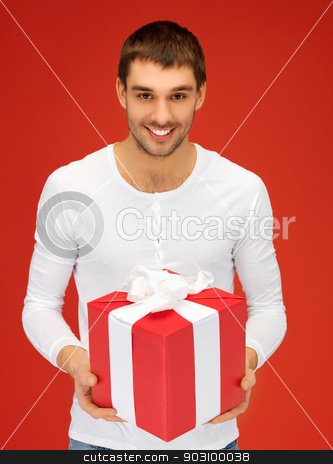 To use this stock image in your creative project, please select the size you need over to the right and click the "Add to Cart" button.
Your downloaded image will come with the Cutcaster watermark removed so don’t worry about the watermark you see on this page. handsome man with a gift stock photo, bright picture of handsome man with a gift . by Syda Productions