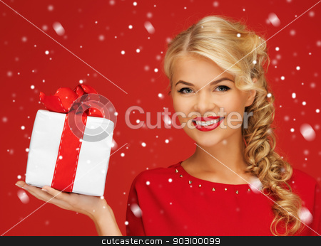 To use this stock image in your creative project, please select the size you need over to the right and click the "Add to Cart" button.
Your downloaded image will come with the Cutcaster watermark removed so don’t worry about the watermark you see on this page. lovely woman in red dress with present stock photo, picture of lovely woman in red dress with present by Syda Productions