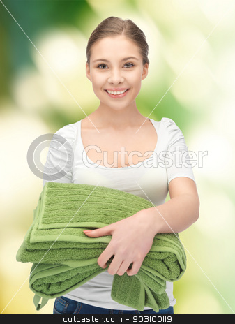 To use this stock image in your creative project, please select the size you need over to the right and click the "Add to Cart" button.
Your downloaded image will come with the Cutcaster watermark removed so don’t worry about the watermark you see on this page. lovely housewife with towels stock photo, bright picture of lovely housewife with towels by Syda Productions