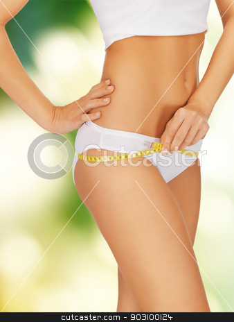 To use this stock image in your creative project, please select the size you need over to the right and click the "Add to Cart" button.
Your downloaded image will come with the Cutcaster watermark removed so don’t worry about the watermark you see on this page. woman with measure tape stock photo, closeup picture of woman with measure tape by Syda Productions