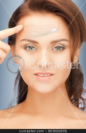 To use this stock image in your creative project, please select the size you need over to the right and click the "Add to Cart" button.
Your downloaded image will come with the Cutcaster watermark removed so don’t worry about the watermark you see on this page. beautiful woman stock photo, bright closeup portrait picture of beautiful woman by Syda Productions